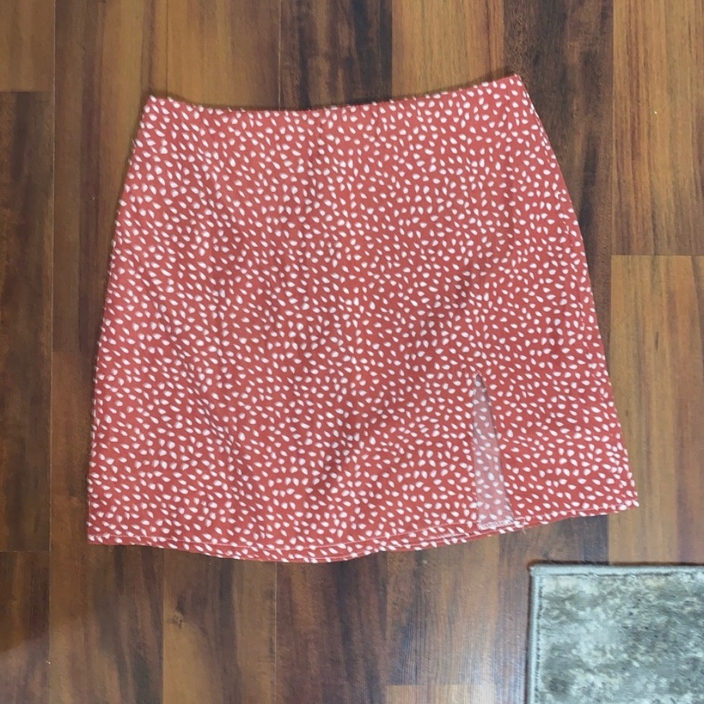 Red and white polka dot skirt.